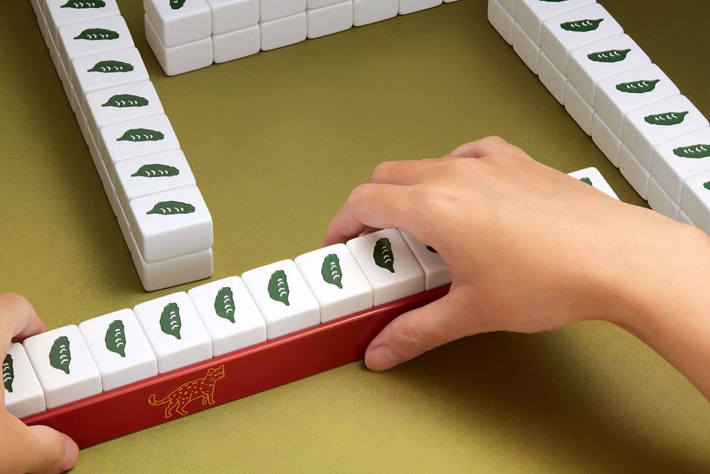 讓牌桌上充滿台灣在地風情的「台灣麻將」！台北 101、媽祖、珍珠奶茶等圖騰成另類符號