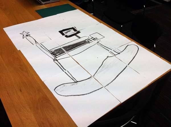 把小朋友認真設計的塗鴉家具實體化