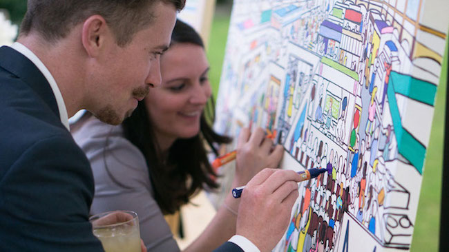 把著色畫放在牆上，大家一起來注入色彩